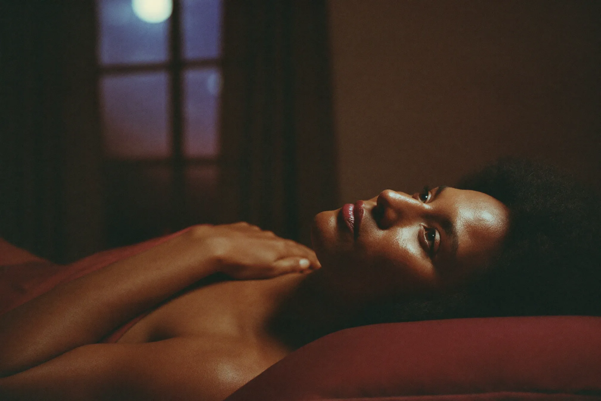 A woman in her fifties lying awake at night